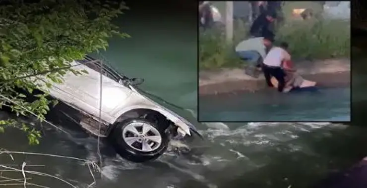 Kanala devrilen otomobildekilere yardım için suya atladı, hayatını kaybetti